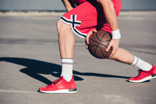 A basketballer playing basketball