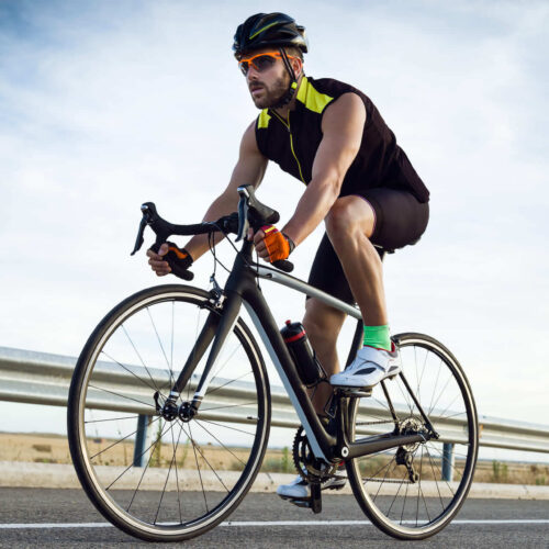 A young man cycling